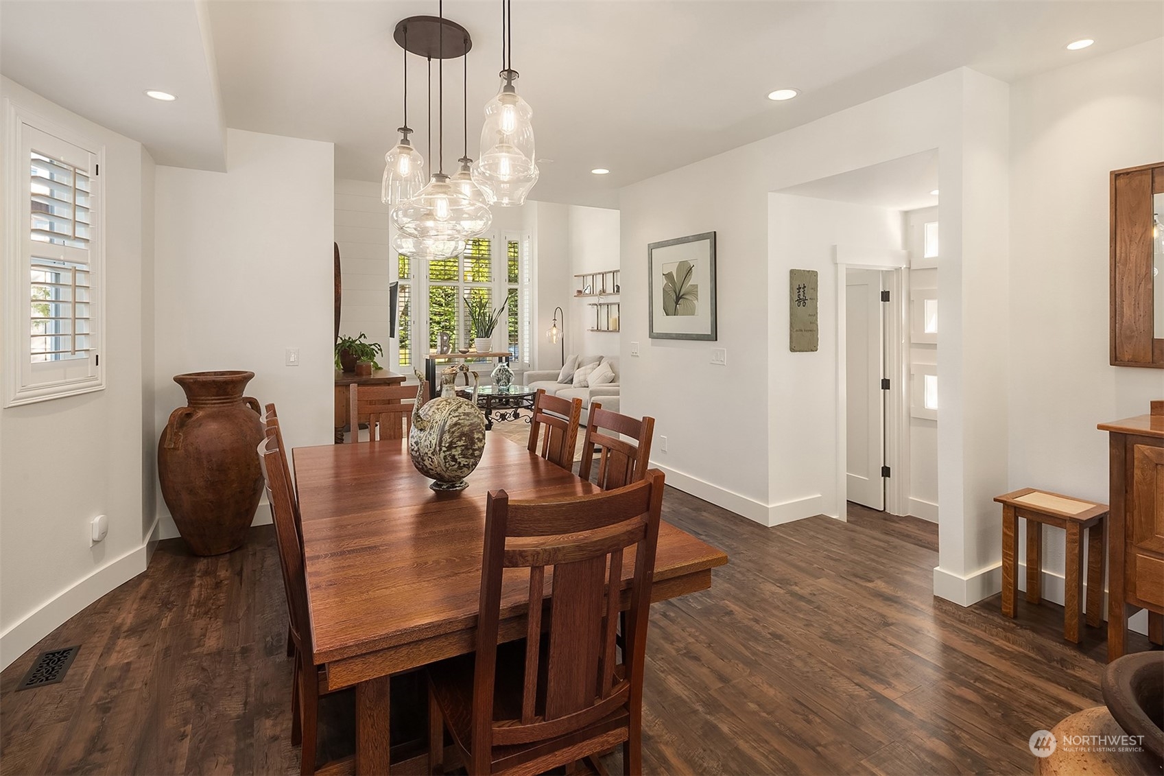 4401 Brygger Drive West Seattle, WA 98199 - Photo 12 of 36 a view of a a dining room with furniture window and wooden floor