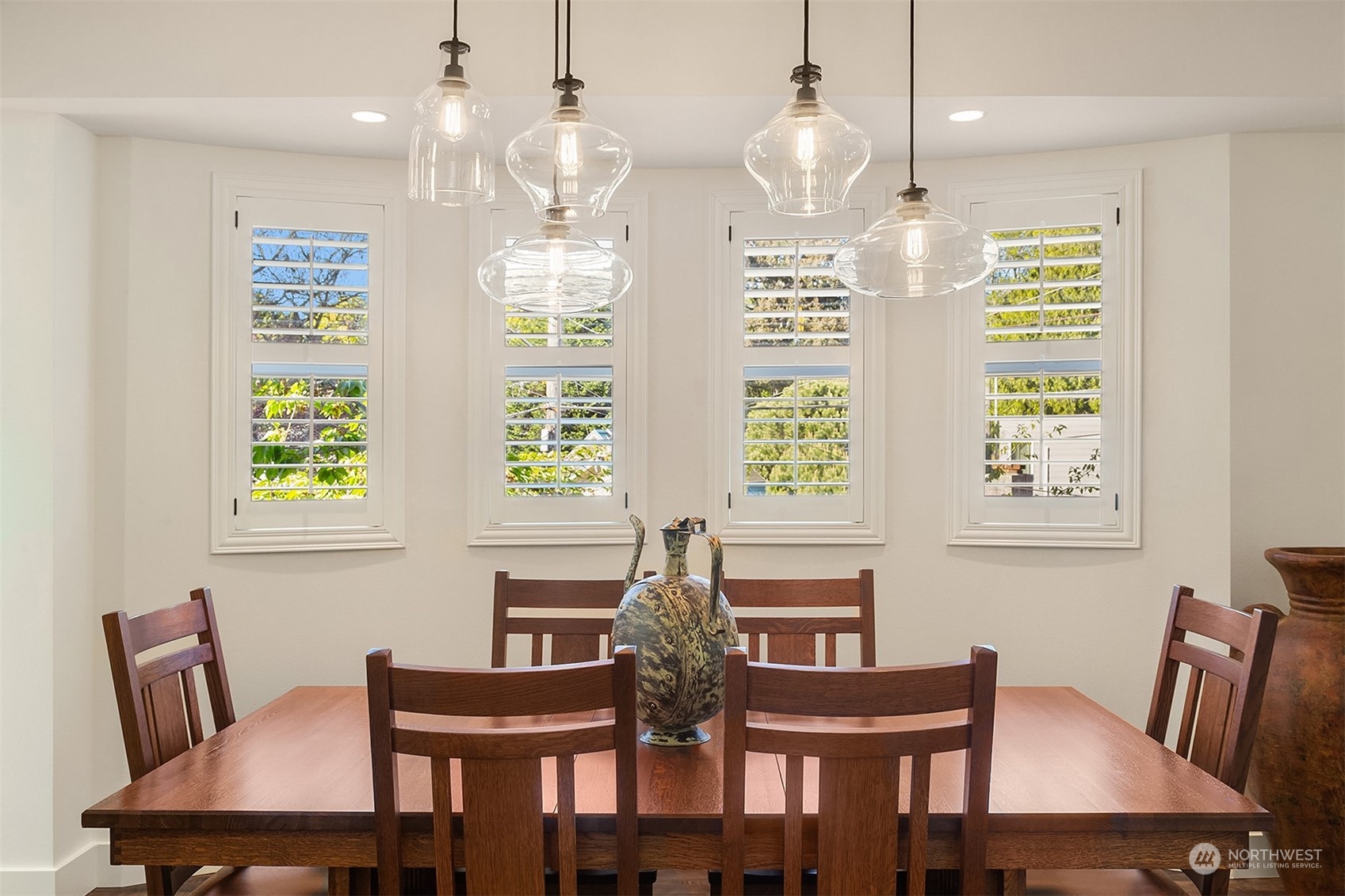 4401 Brygger Drive West Seattle, WA 98199 - Photo 13 of 36 a view of a dining room with furniture and chandelier