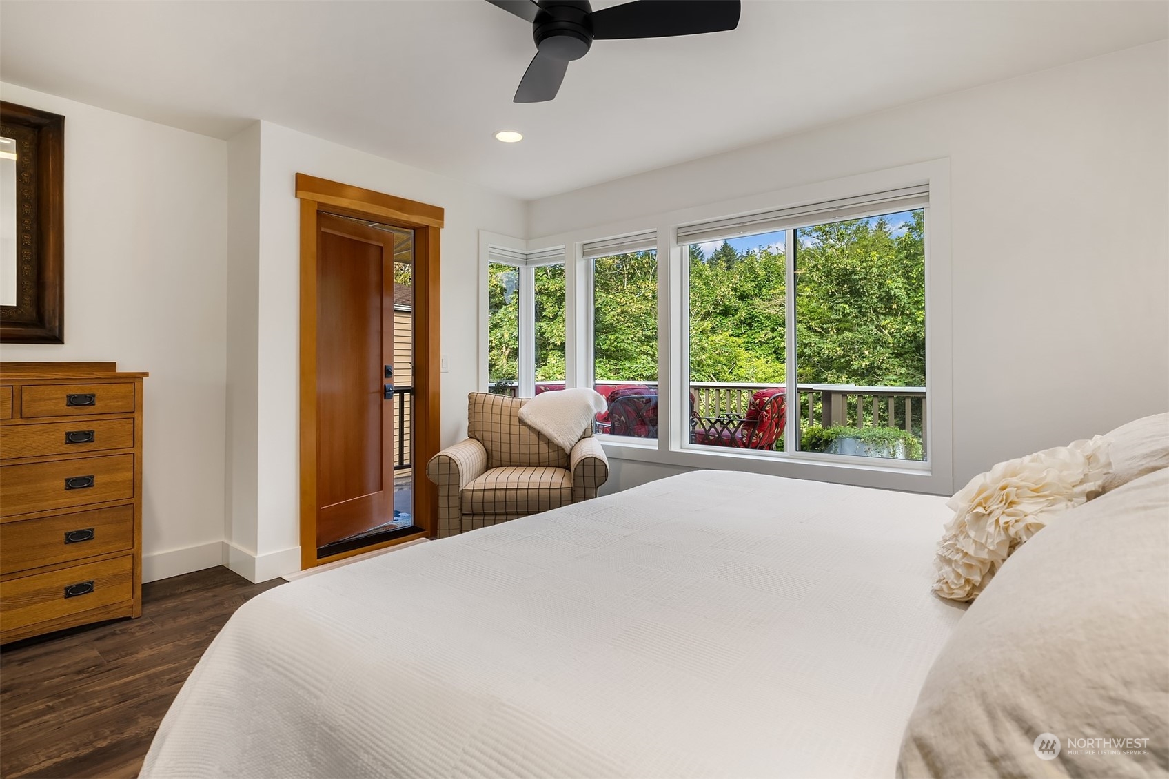 4401 Brygger Drive West Seattle, WA 98199 - Photo 17 of 36 a bed room with a bed and a television