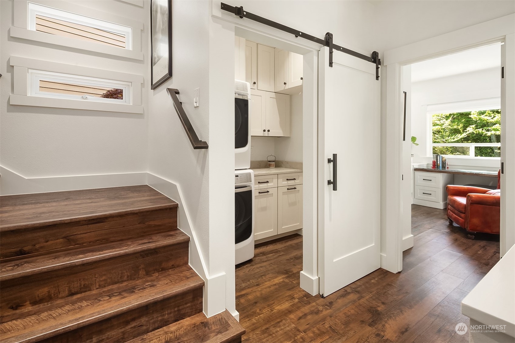 4401 Brygger Drive West Seattle, WA 98199 - Photo 23 of 36 a view of entryway and hall with wooden floor