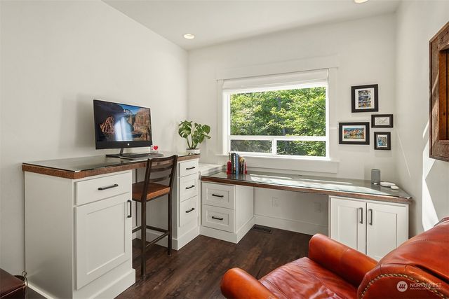 a kitchen with stainless steel appliances granite countertop a stove a sink dishwasher and a microwave