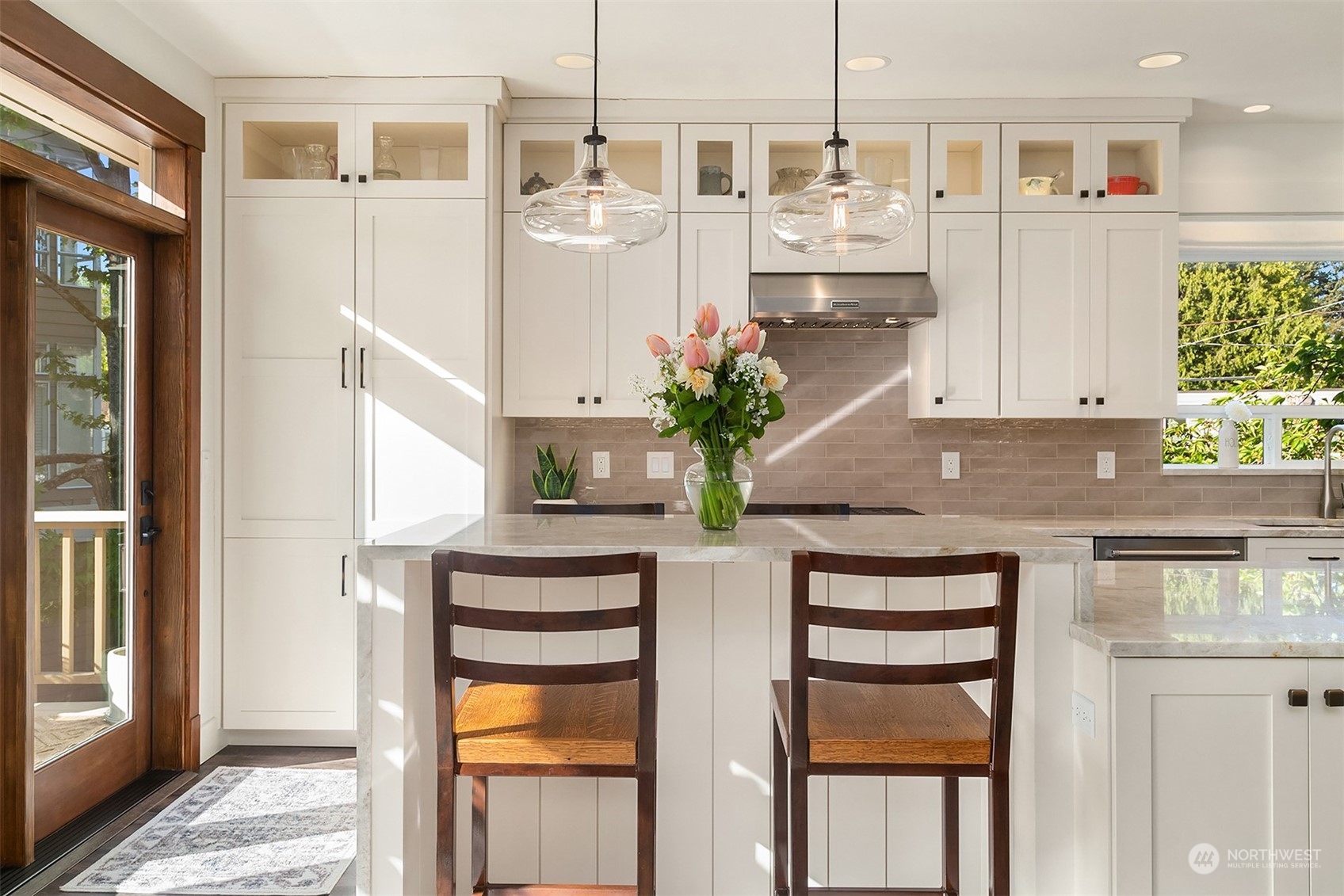 4401 Brygger Drive West Seattle, WA 98199 - Photo 4 of 36 a kitchen with stainless steel appliances granite countertop a refrigerator and a stove