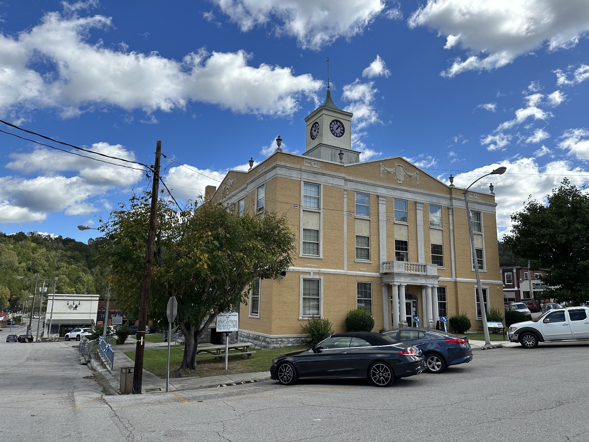 0 Hopkins Hollow Road Gainesboro, TN 38562 - Photo 24 of 26 a front view of a building with lot of cars and trees
