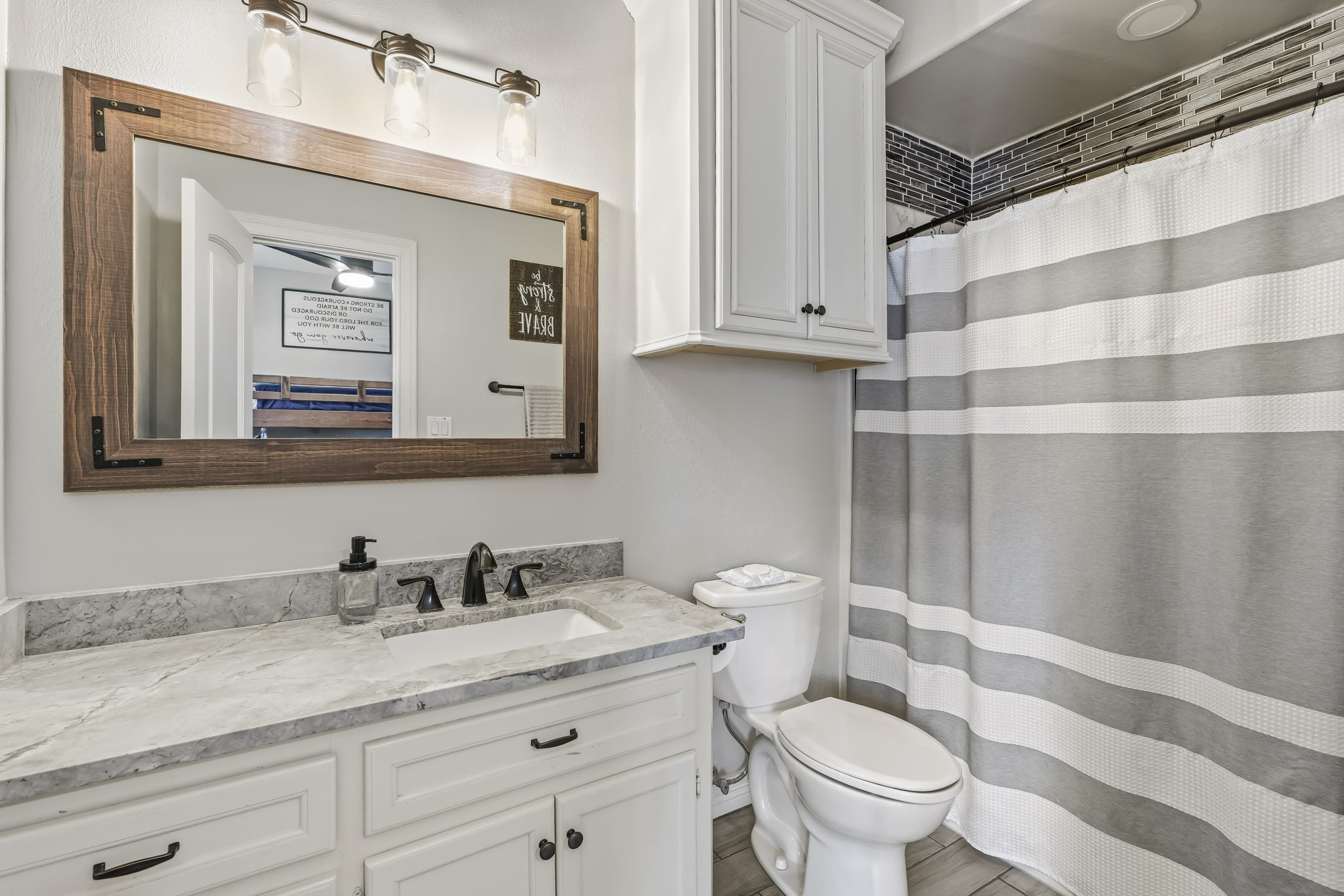 3630 Orca Court Spring, TX 77388 - Photo 38 of 50 Luxurious ensuite bath with modern fixtures and elegant finishes.