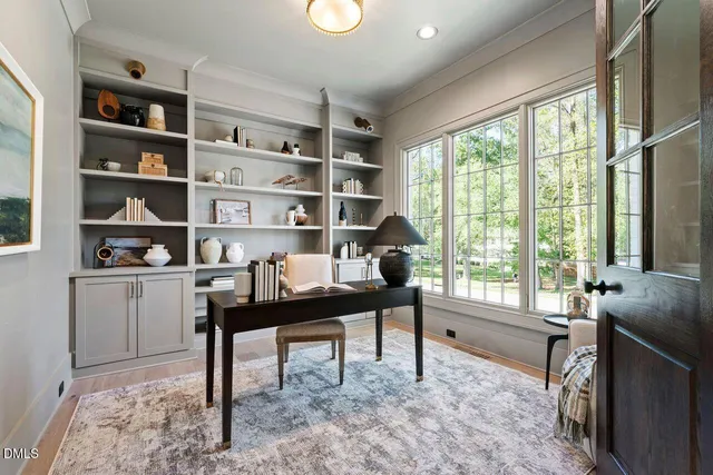 a kitchen with a shelf and cabinets