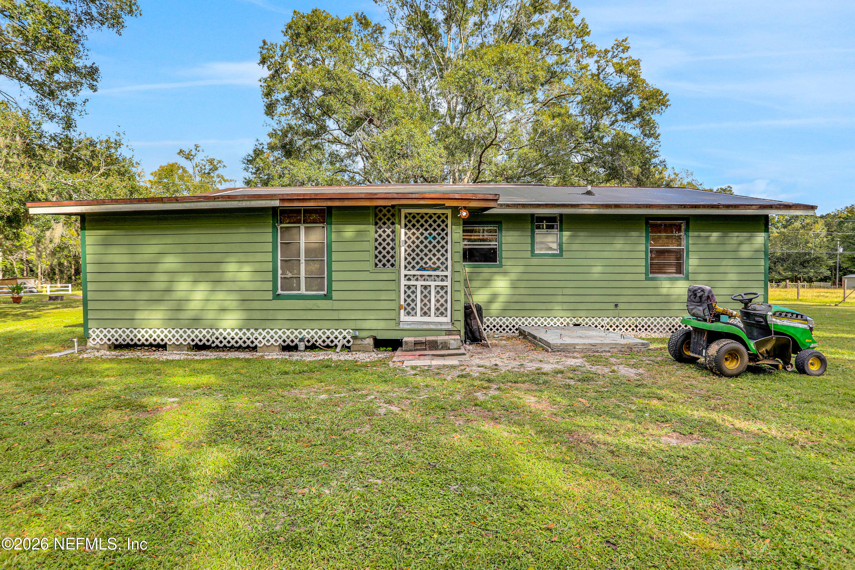 1702 Balboa Lane Middleburg, FL 32068 - Photo 17 of 31 a view of a house with a patio
