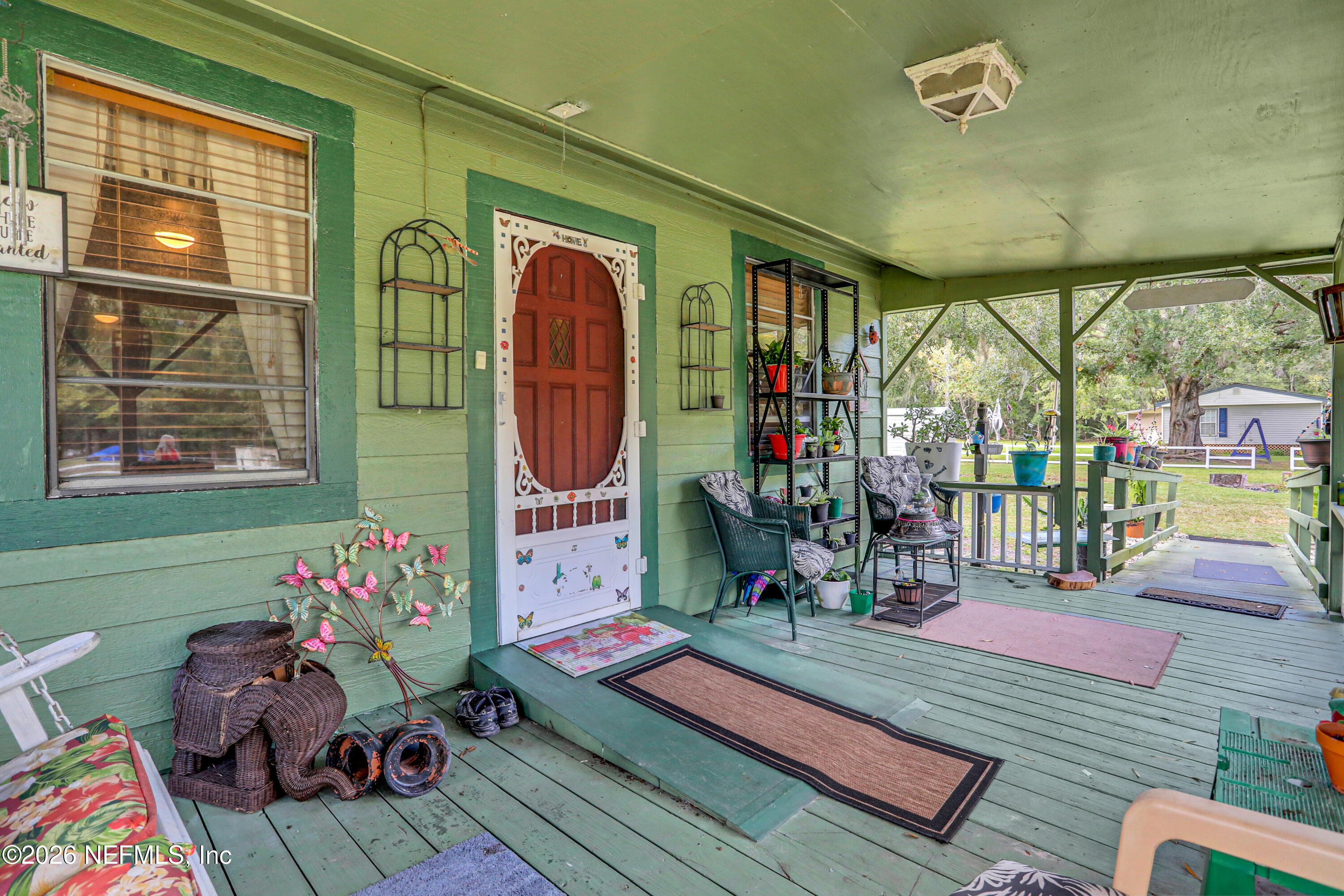 1702 Balboa Lane Middleburg, FL 32068 - Photo 2 of 31 a living room filled with furniture