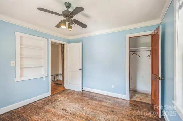 wooden floor and window in an empty room
