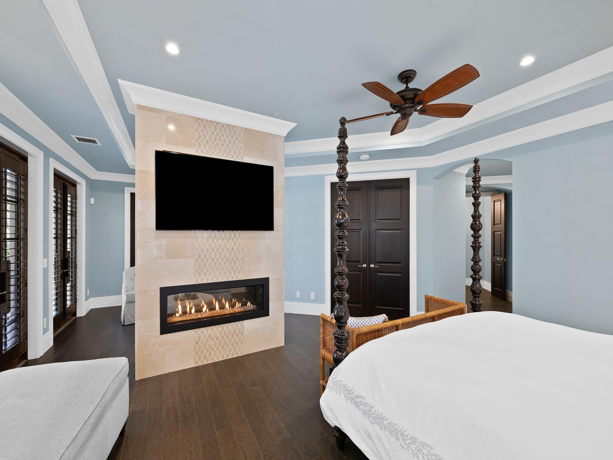 2319 Northeast 28th Street Lighthouse Point, FL 33064 - Photo 28 of 59 a bed room with a bed and a television