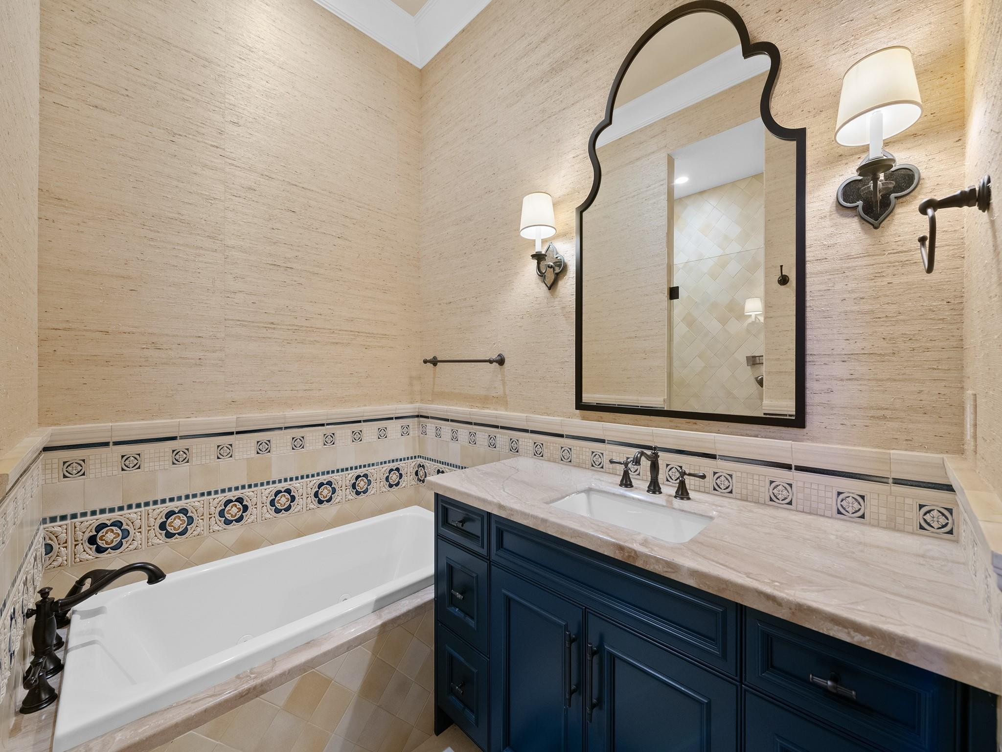 2319 Northeast 28th Street Lighthouse Point, FL 33064 - Photo 35 of 59 a bathroom with a sink and a mirror