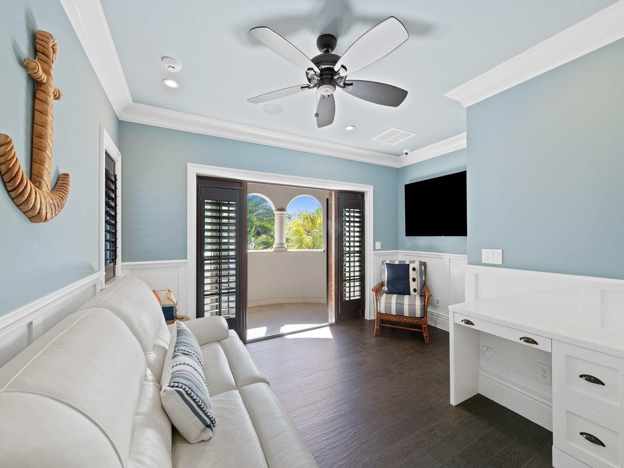 2319 Northeast 28th Street Lighthouse Point, FL 33064 - Photo 40 of 59 a bedroom with furniture and a flat screen tv