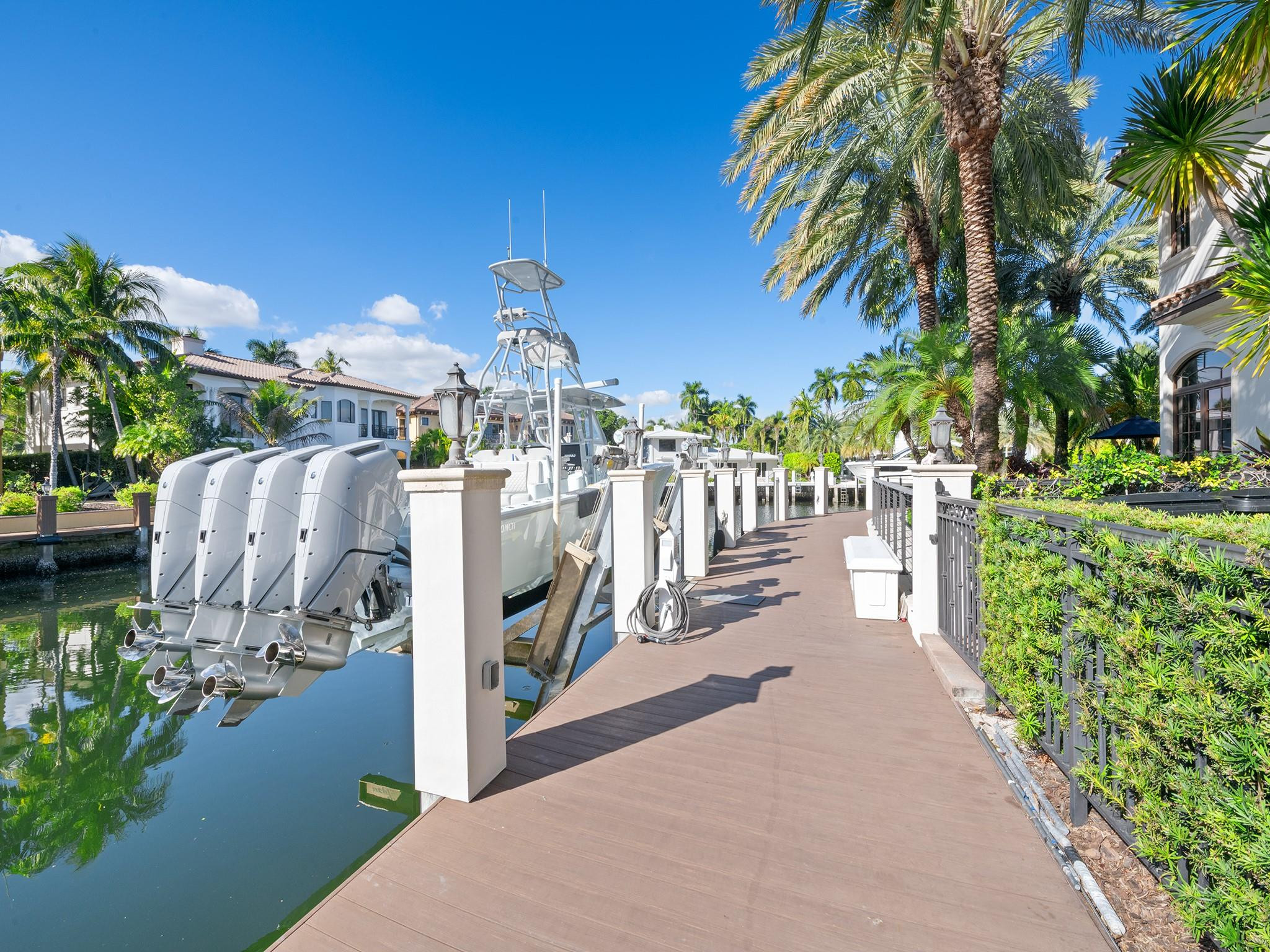 2319 Northeast 28th Street Lighthouse Point, FL 33064 - Photo 47 of 59 a view of a house with backyard and sitting area