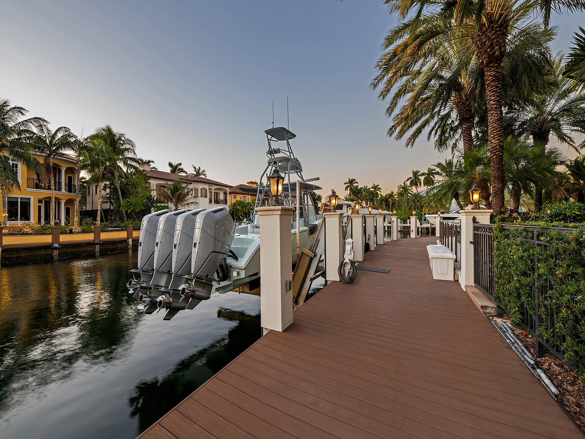 2319 Northeast 28th Street Lighthouse Point, FL 33064 - Photo 55 of 59 a view of a house with backyard and sitting area