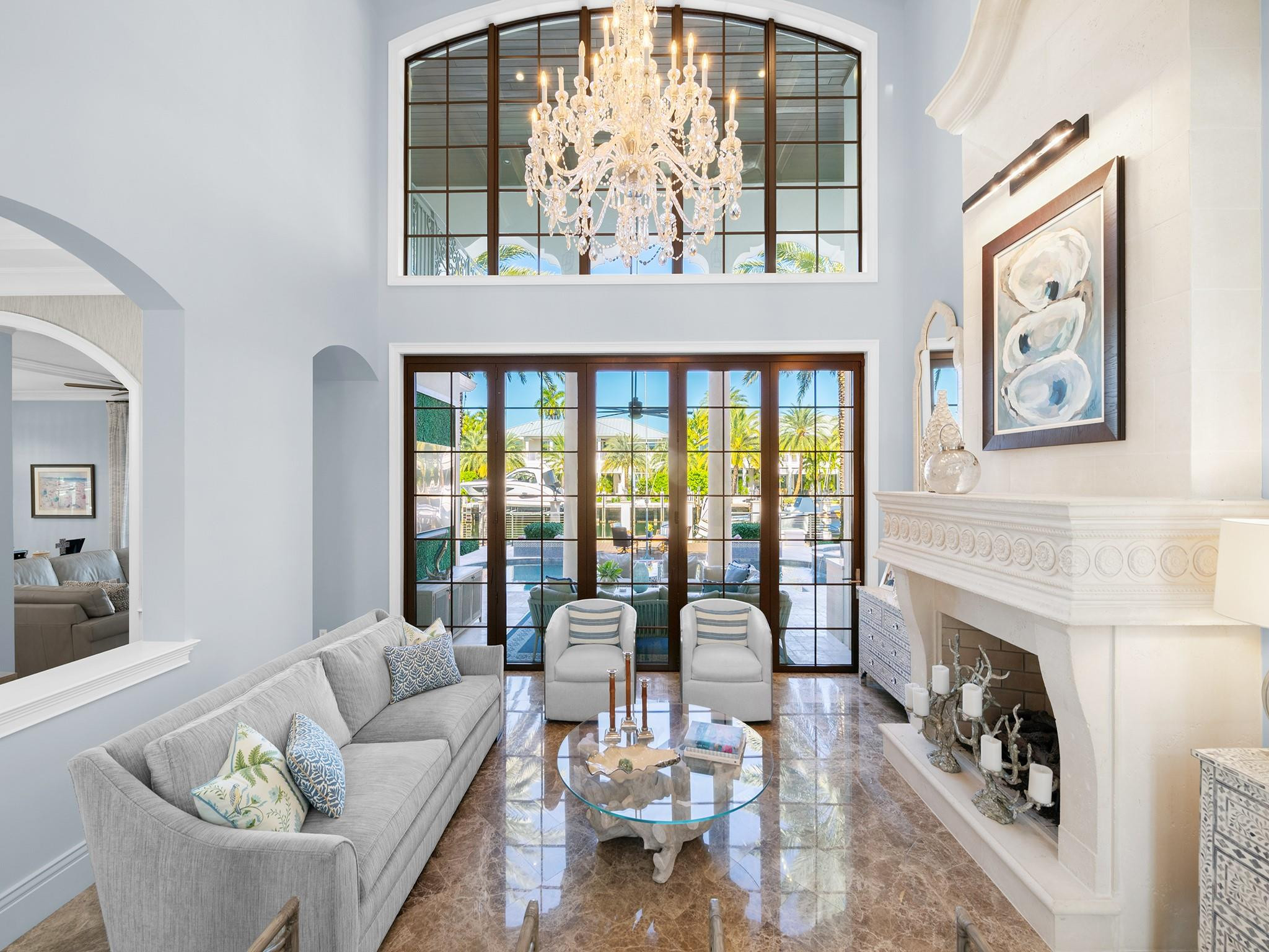 2319 Northeast 28th Street Lighthouse Point, FL 33064 - Photo 9 of 59 a living room with furniture and a fireplace