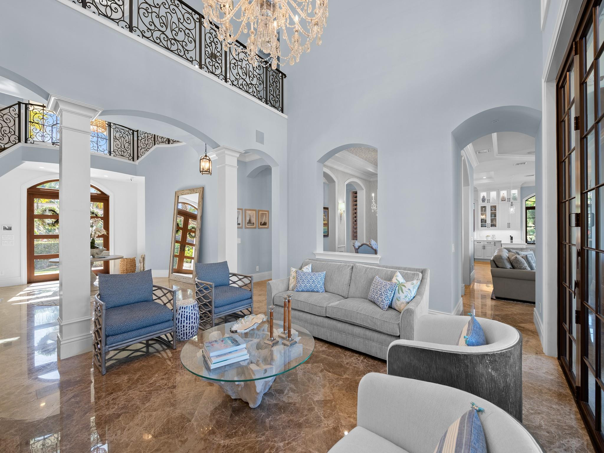 2319 Northeast 28th Street Lighthouse Point, FL 33064 - Photo 10 of 59 a living room with furniture or couch and a dining table with wooden floor