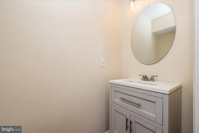 a spacious bedroom with a large bed and a flat screen tv