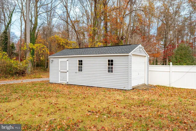 a view of a house with outdoor seating