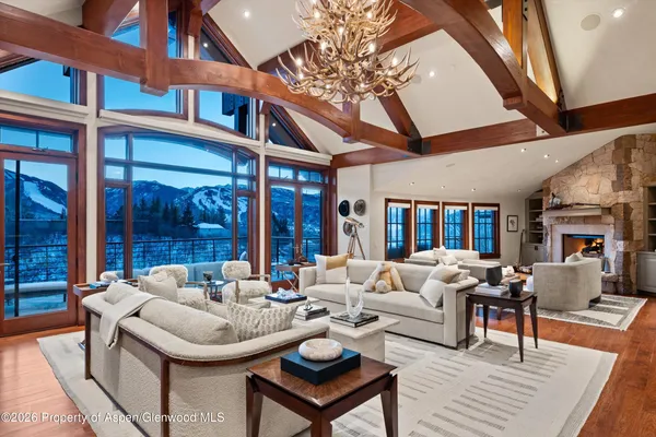 a spacious bedroom with a bed and a couch