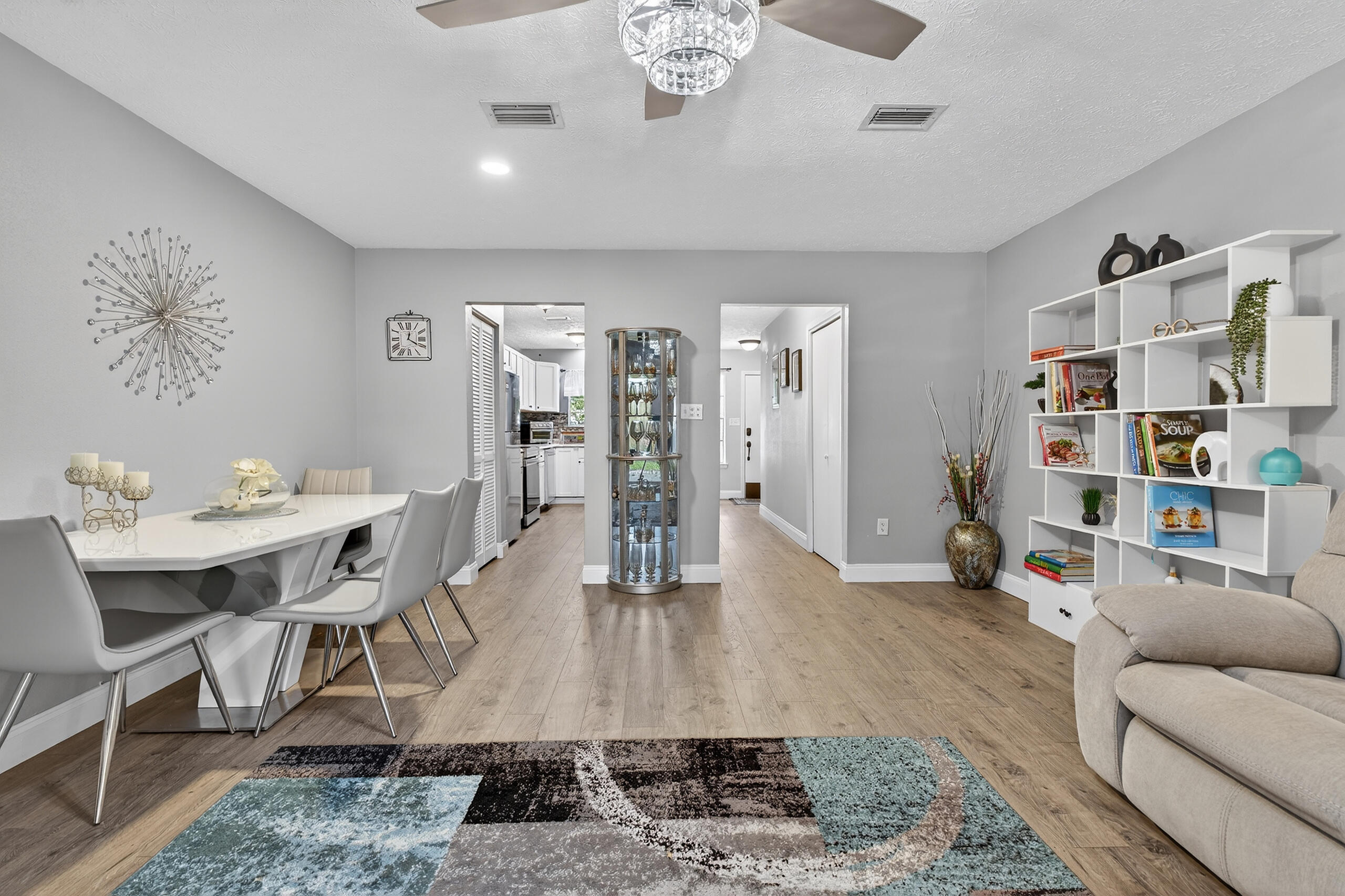 35 10th Street, Unit D Shalimar, FL 32579 - Photo 19 of 33 a living room with furniture and a wooden floor