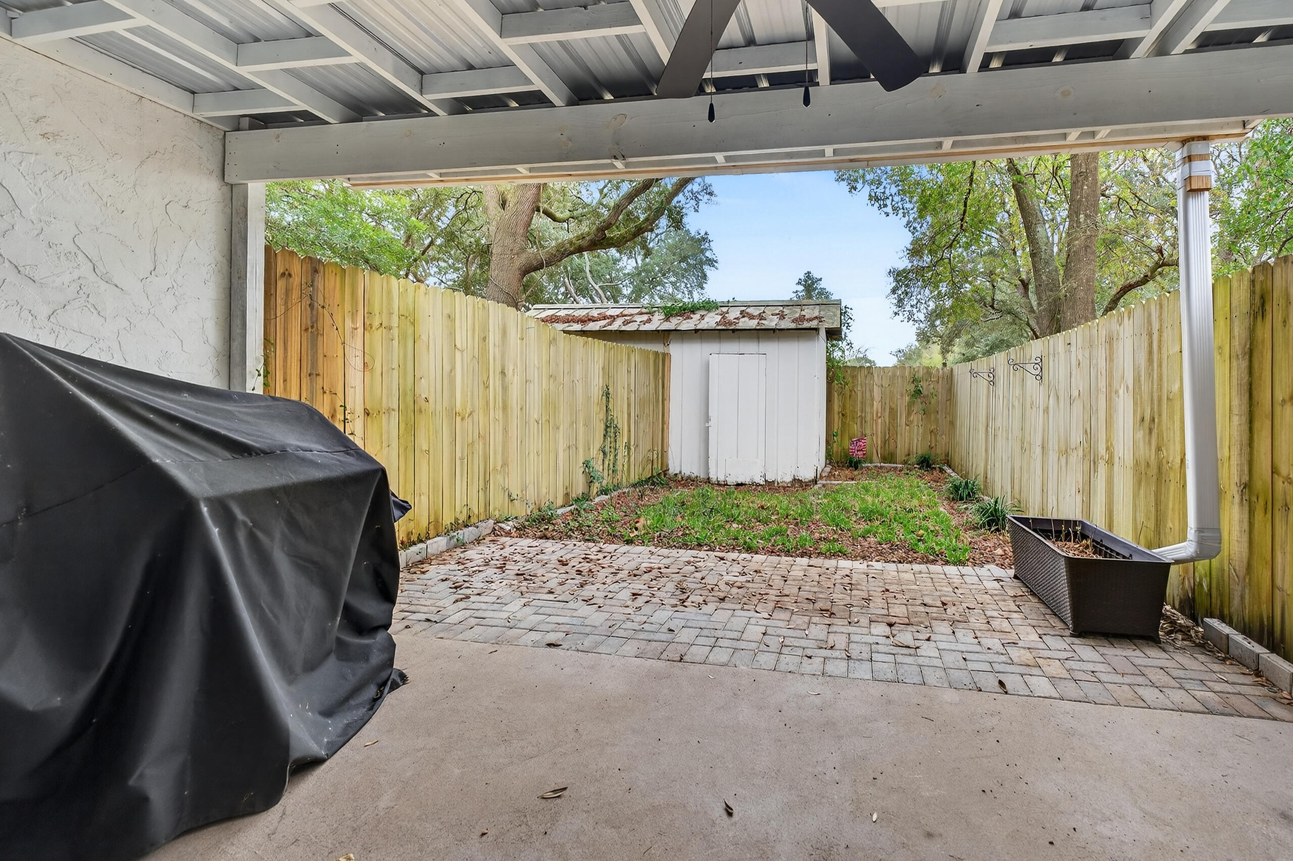 35 10th Street, Unit D Shalimar, FL 32579 - Photo 21 of 33 a view of a back yard of the house