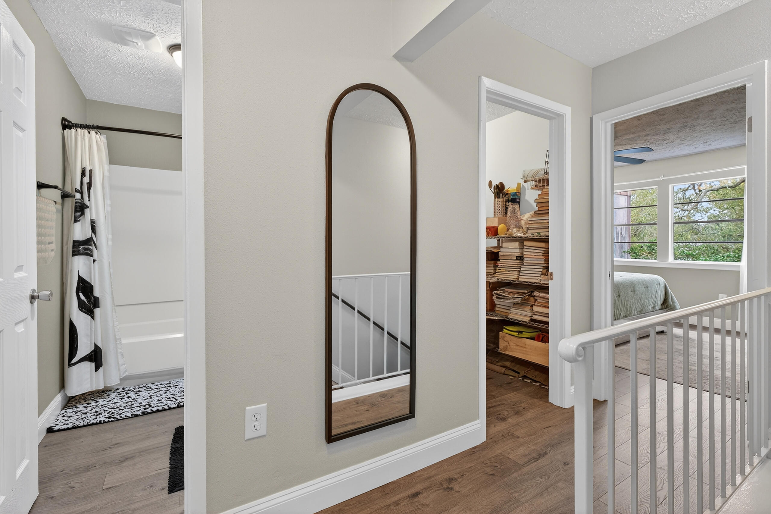 35 10th Street, Unit D Shalimar, FL 32579 - Photo 25 of 33 a view of a hallway with wooden floor and entryway