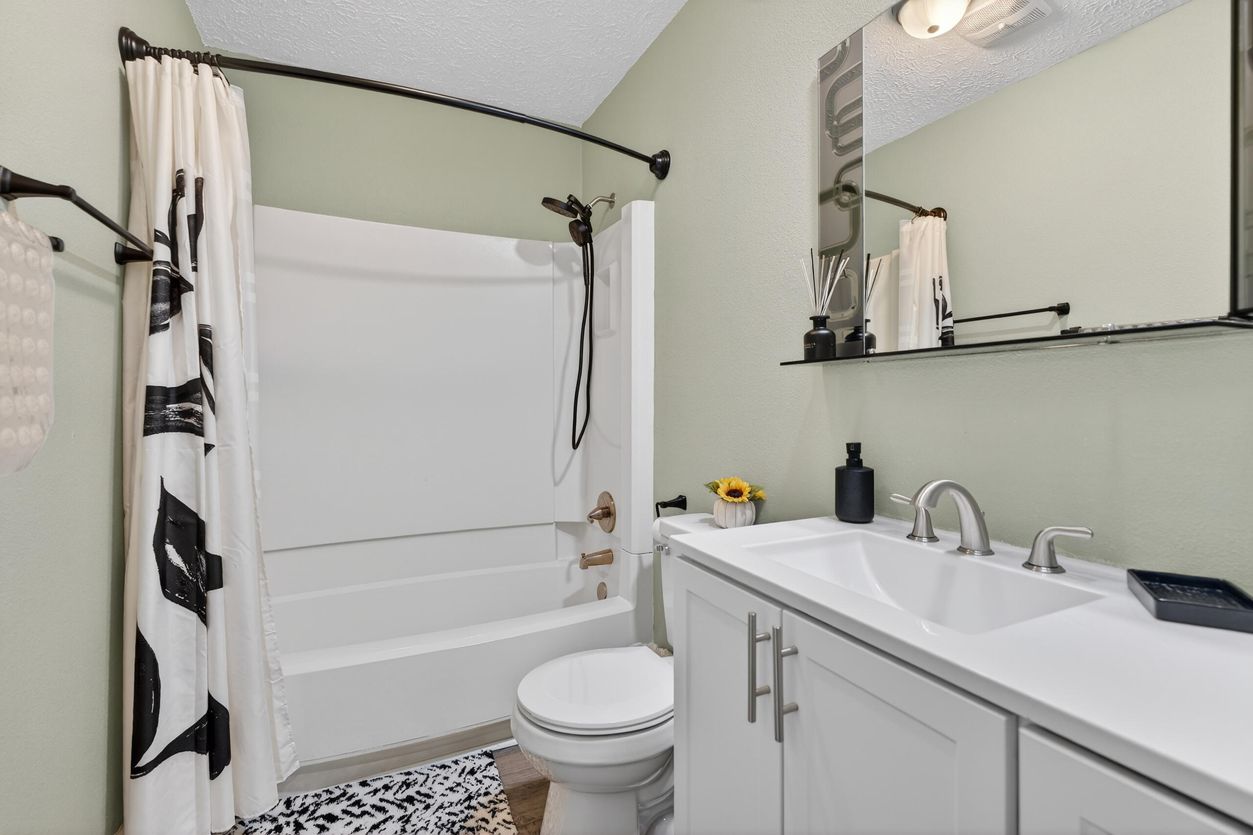 35 10th Street, Unit D Shalimar, FL 32579 - Photo 33 of 33 a bathroom with a sink toilet and shower
