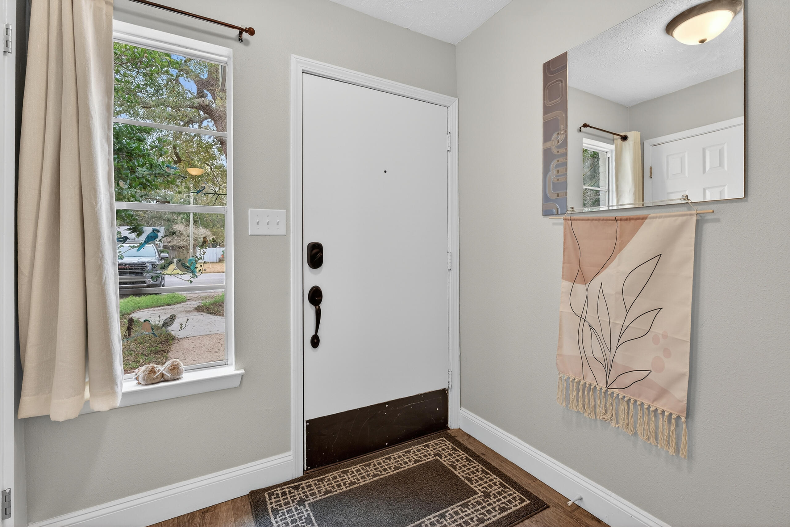 35 10th Street, Unit D Shalimar, FL 32579 - Photo 8 of 33 a view of an entryway with wooden floor