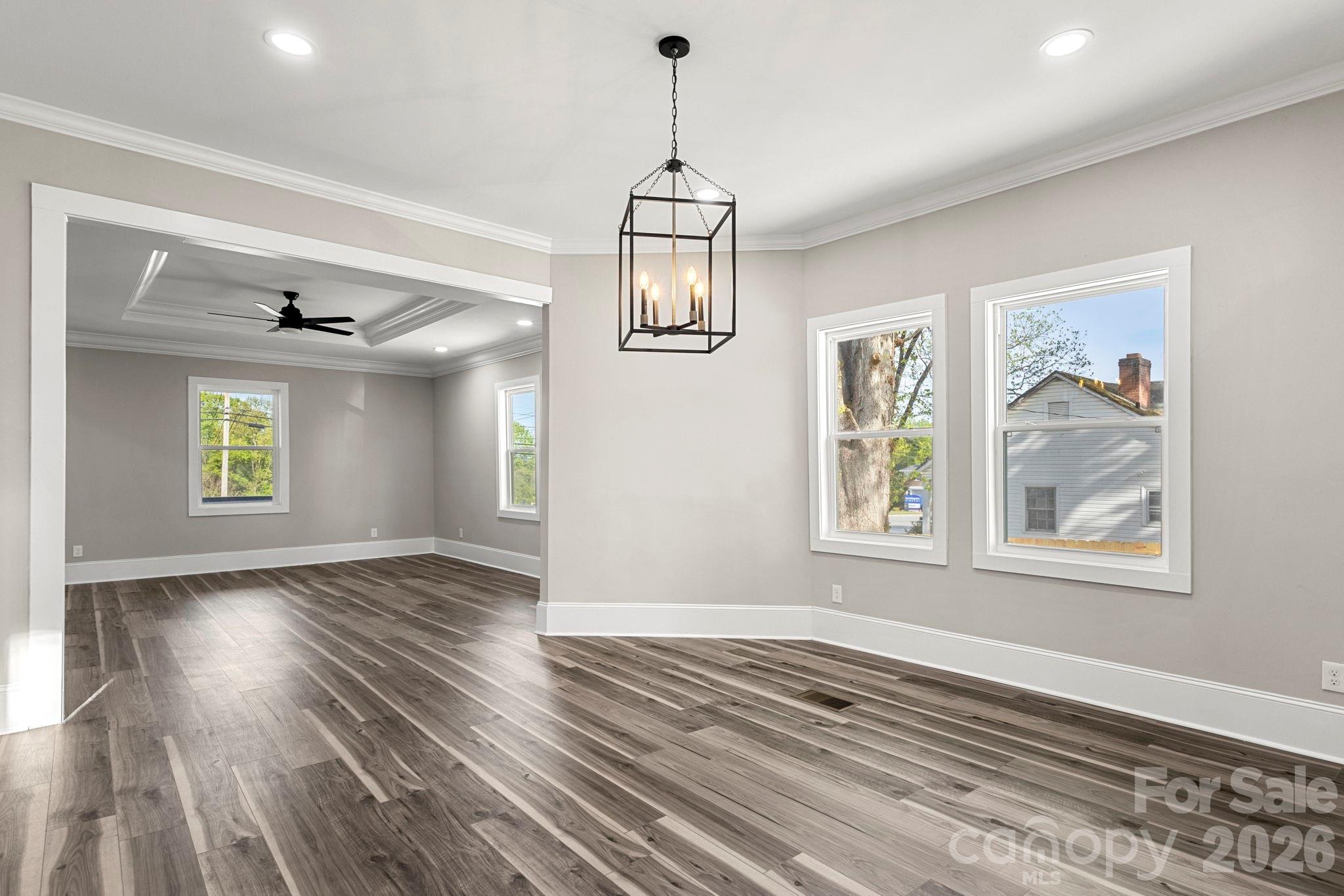 918 North New Hope Road Gastonia, NC 28054 - Photo 15 of 37 wooden floor in an empty room with a window