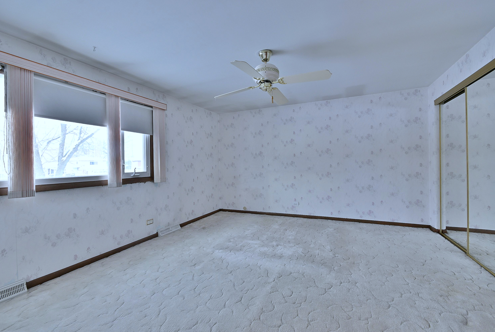 231 North Flora Parkway Addison, IL 60101 - Photo 14 of 39 wooden floor in an empty room with a window