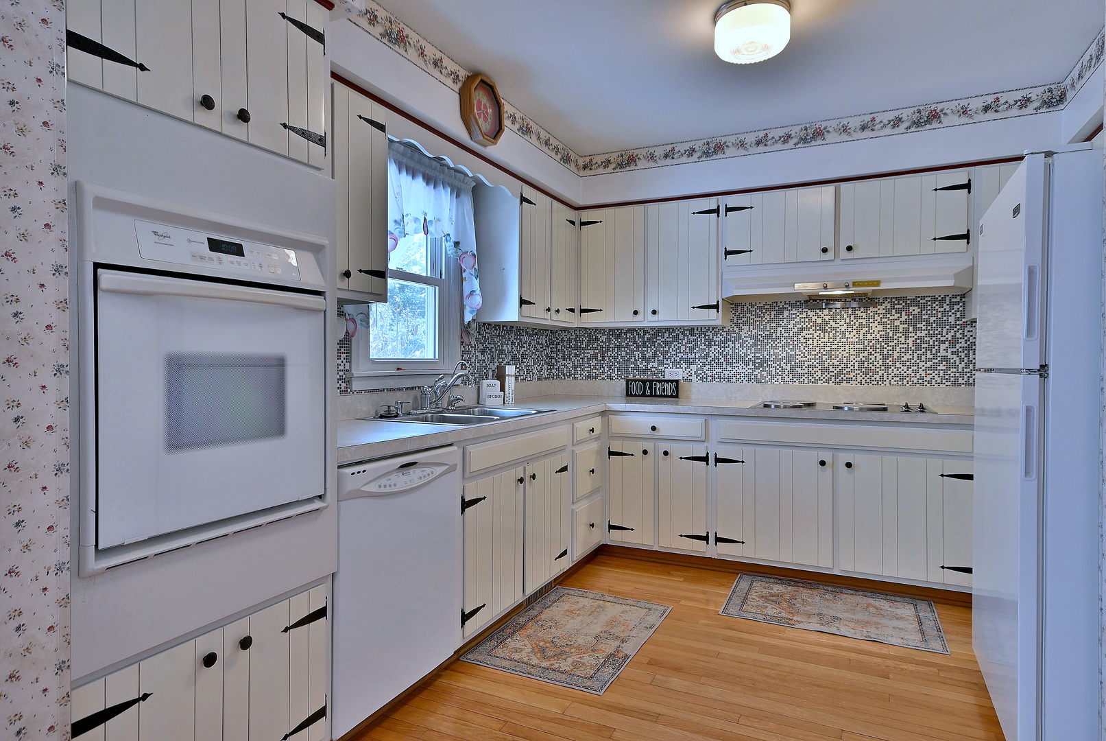 231 North Flora Parkway Addison, IL 60101 - Photo 10 of 39 a kitchen with granite countertop cabinets stainless steel appliances and a counter space