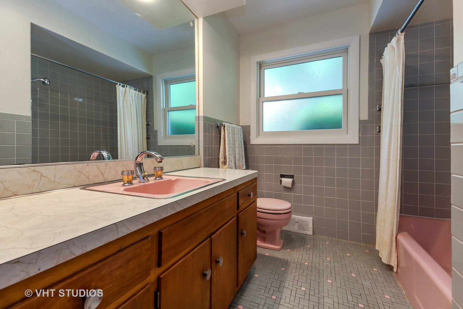 465 Sumac Road Highland Park, IL 60035 - Photo 12 of 19 a bathroom with a granite countertop sink toilet and mirror
