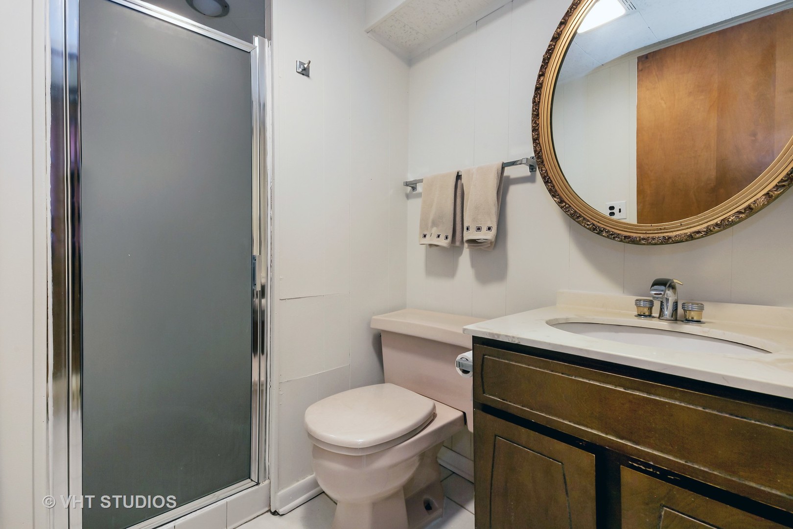 465 Sumac Road Highland Park, IL 60035 - Photo 13 of 19 a bathroom with a granite countertop toilet sink mirror and vanity