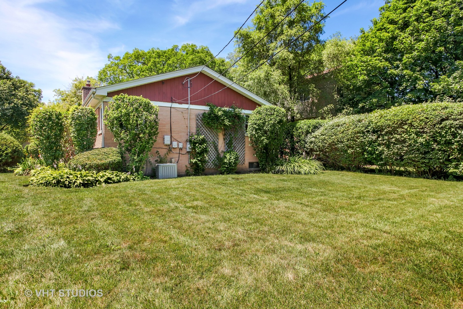 465 Sumac Road Highland Park, IL 60035 - Photo 18 of 19 a view of a wooden house with a yard
