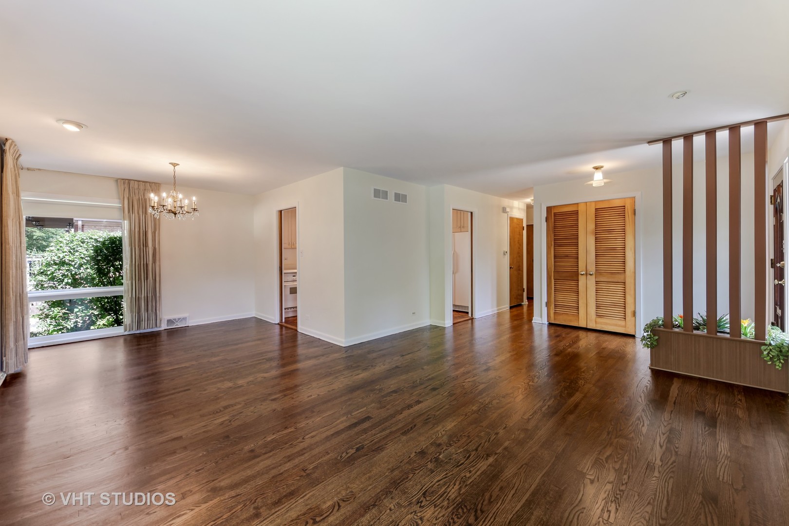 465 Sumac Road Highland Park, IL 60035 - Photo 4 of 19 a view of an empty room with wooden floor and a window