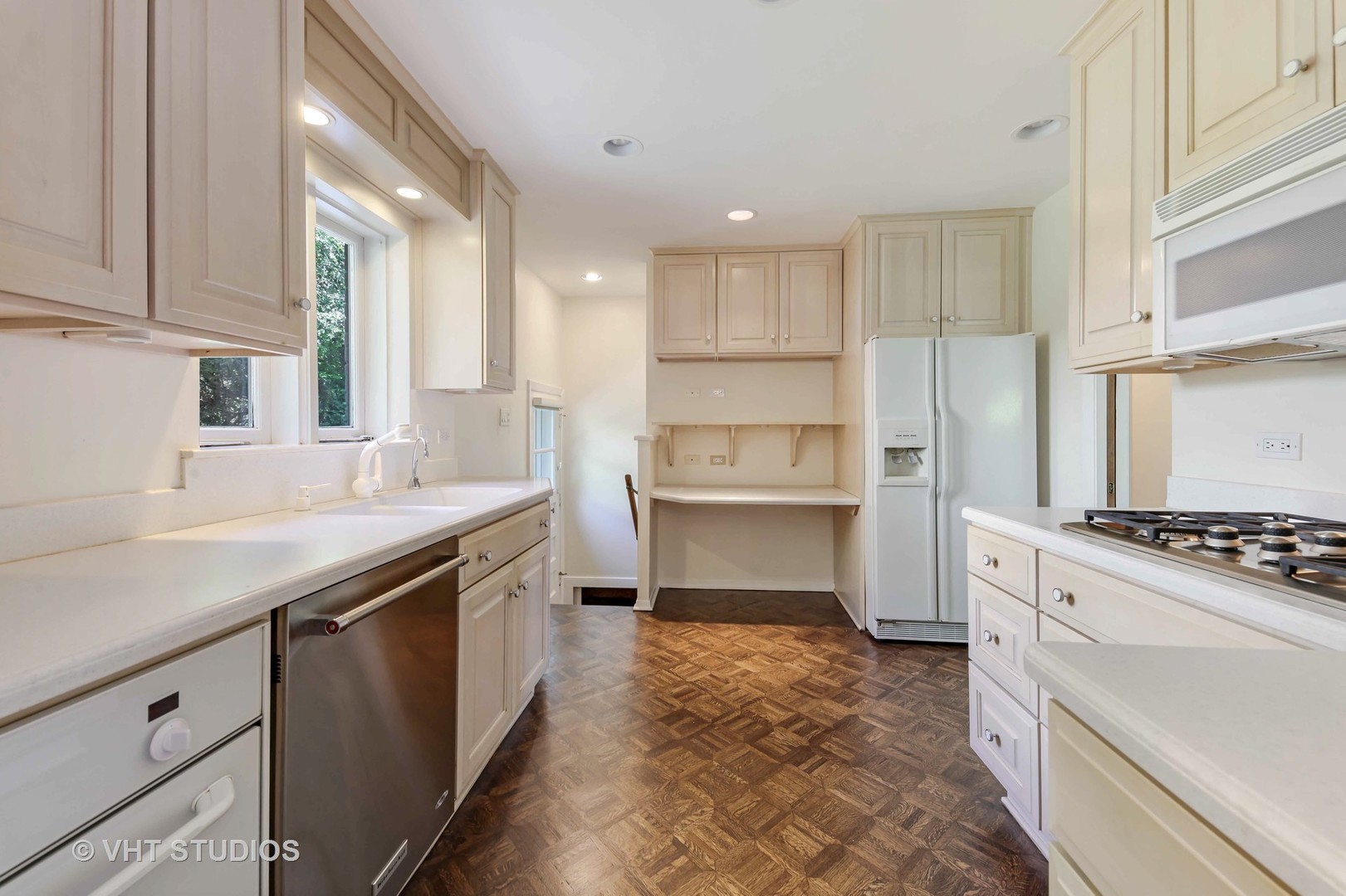 465 Sumac Road Highland Park, IL 60035 - Photo 5 of 19 a kitchen with a stove sink and cabinets