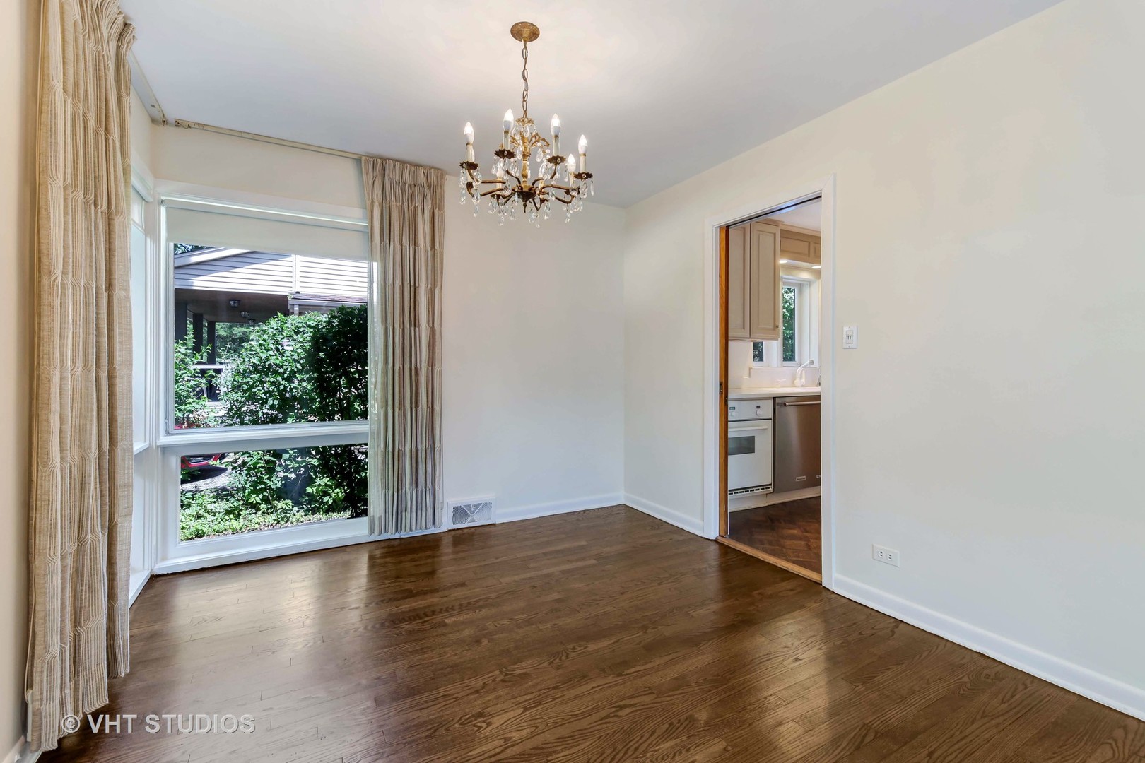 465 Sumac Road Highland Park, IL 60035 - Photo 8 of 19 wooden floor in an empty room with a window