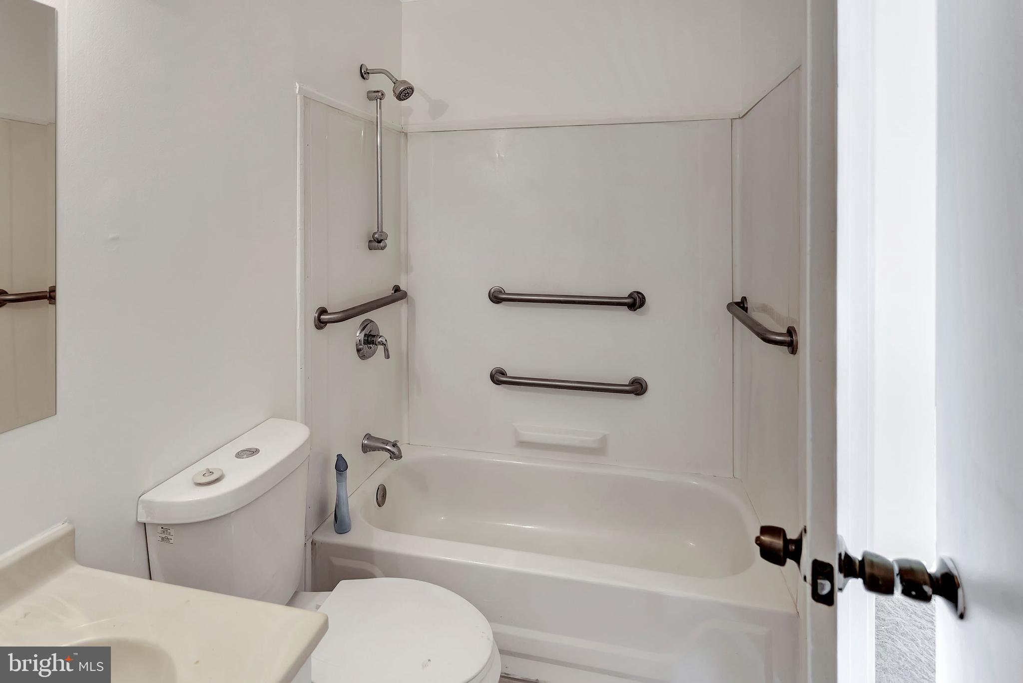 2347 McCulloh Street Baltimore, MD 21217 - Photo 18 of 28 a bathroom with a toilet and a shower