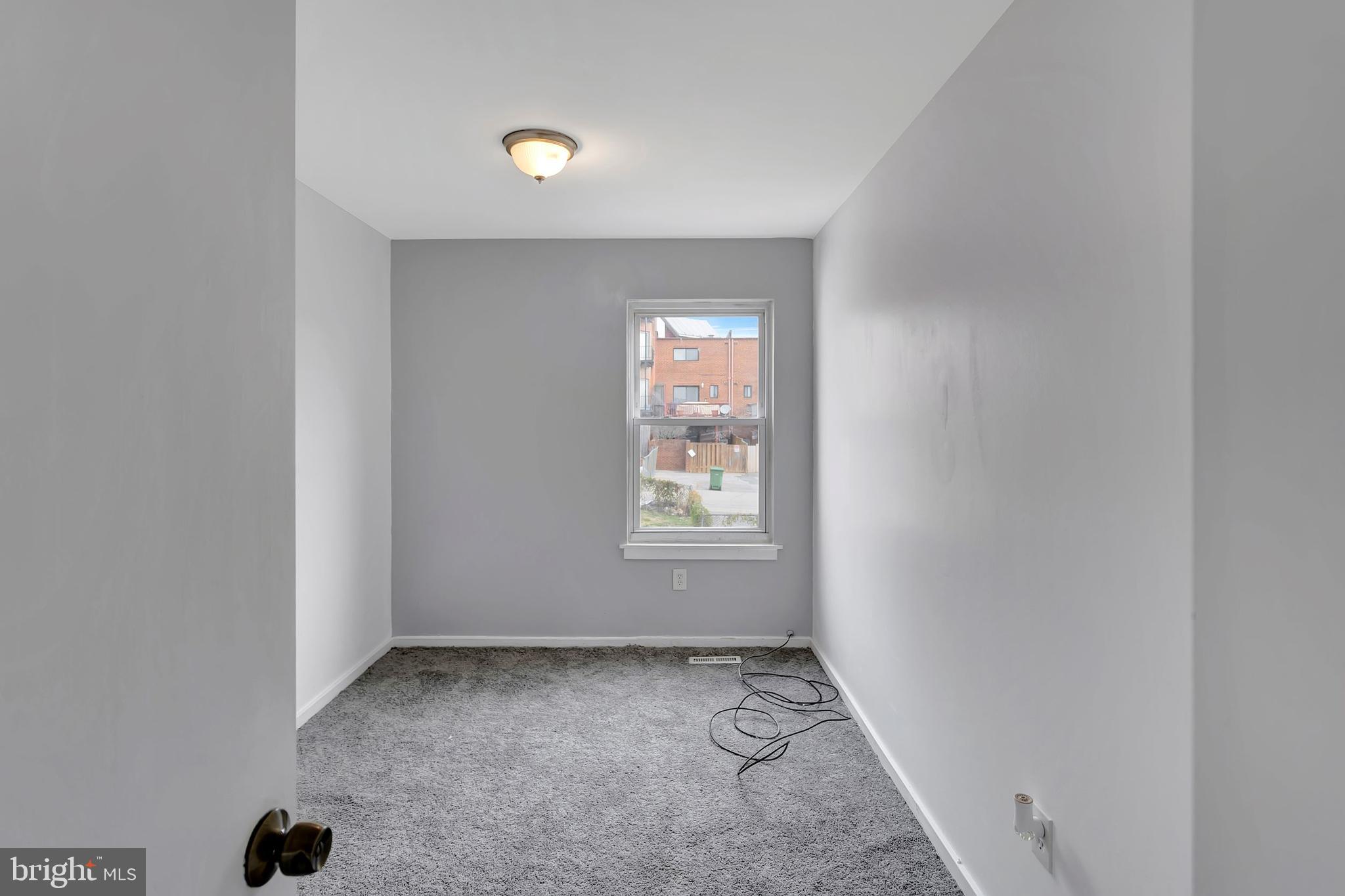 2347 McCulloh Street Baltimore, MD 21217 - Photo 19 of 28 a view of a window in an empty room