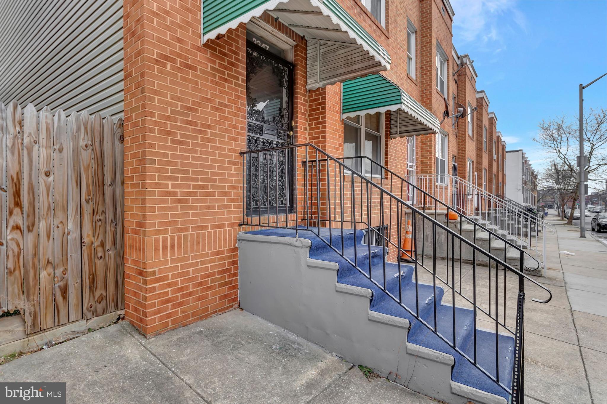 2347 McCulloh Street Baltimore, MD 21217 - Photo 2 of 28 a view of a house with wooden stairs