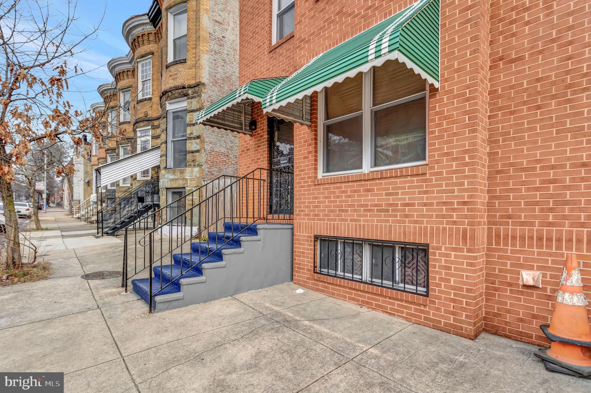2347 McCulloh Street Baltimore, MD 21217 - Photo 3 of 28 a view of a house with a yard