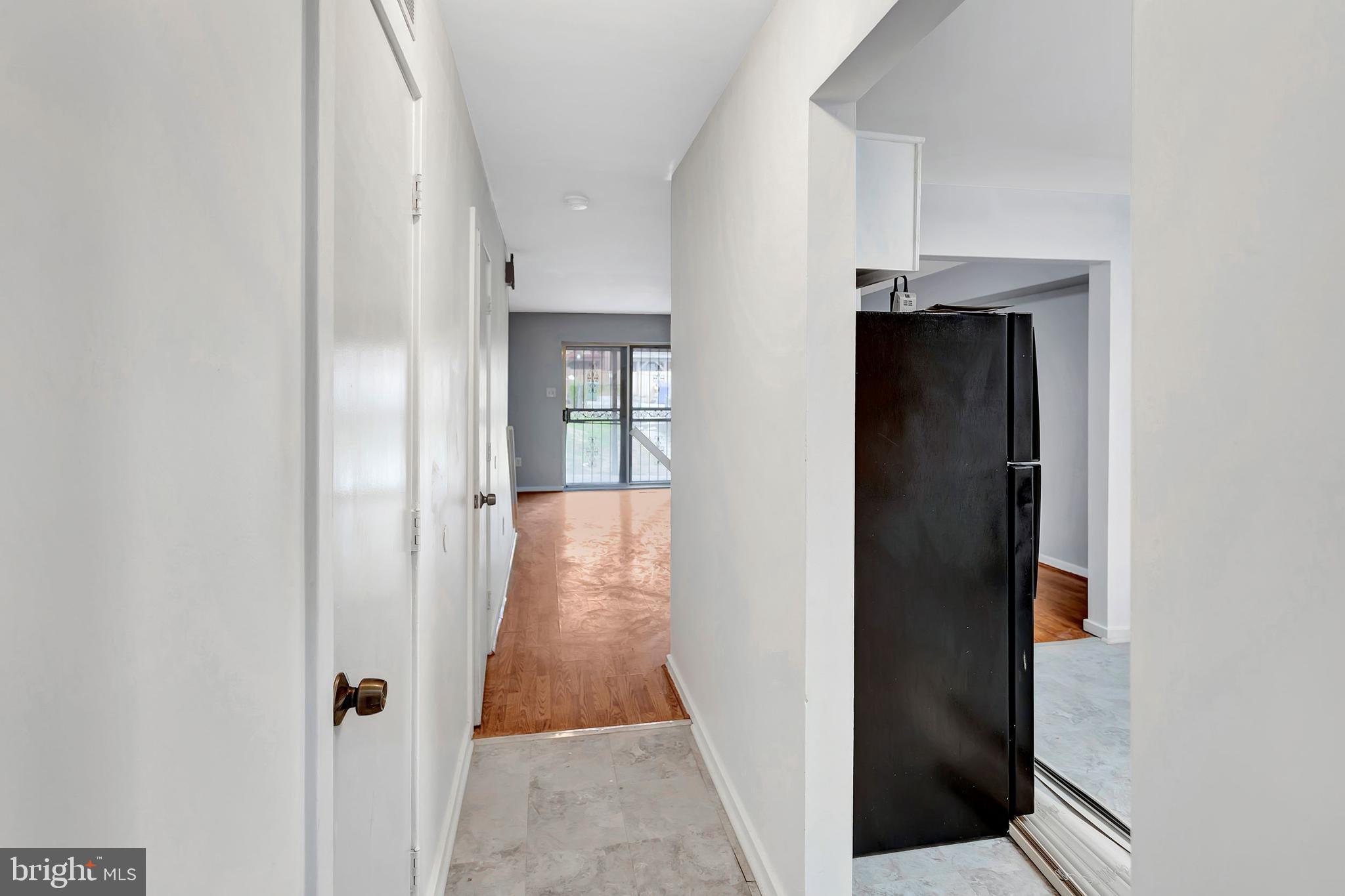 2347 McCulloh Street Baltimore, MD 21217 - Photo 4 of 28 an entryway with a white walls and stairs