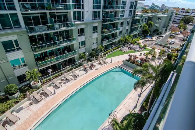 a view of a balcony with an outdoor seating
