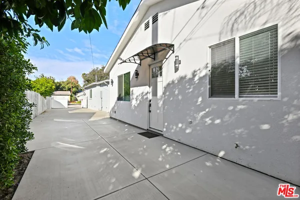 a view of a house with a street