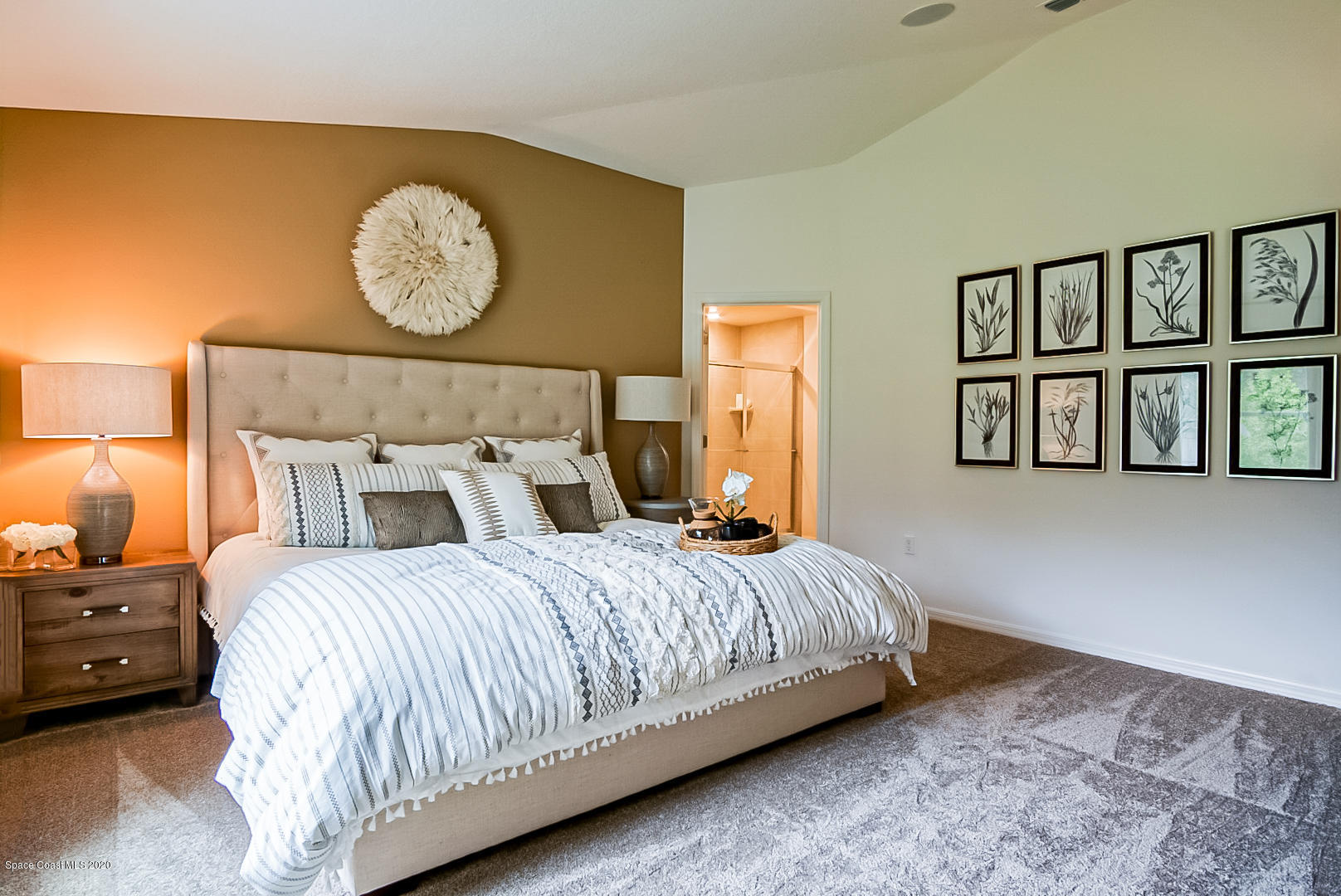 261 Abalone Road Northwest Palm Bay, FL 32907 - Photo 15 of 18 a bedroom with a bed and painting on the wall