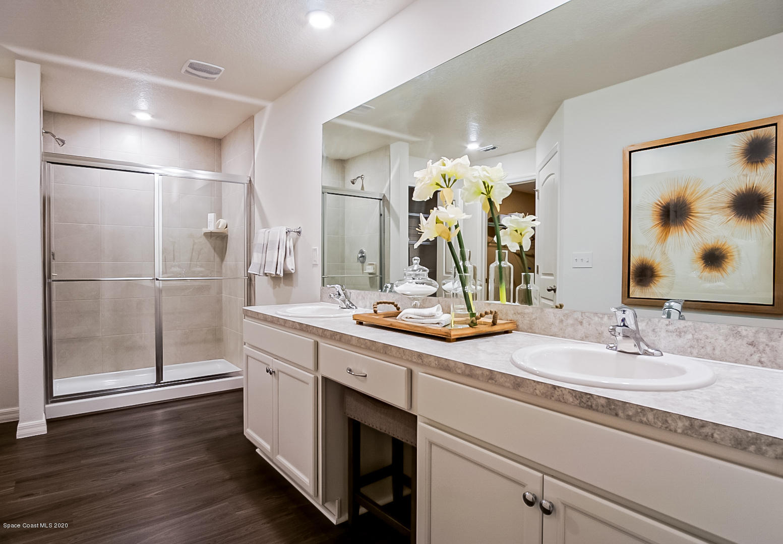 261 Abalone Road Northwest Palm Bay, FL 32907 - Photo 17 of 18 a bathroom with a double vanity sink mirror and double