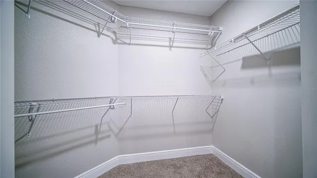 a view of a room with racks on the wall