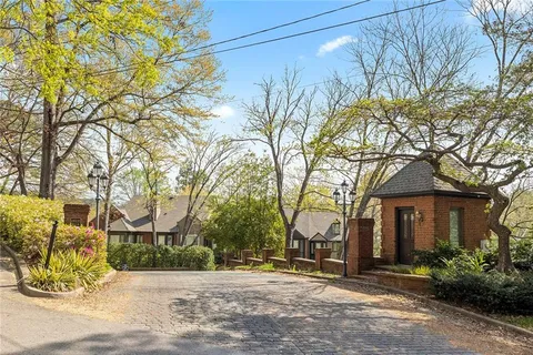 front view of a house with a trees