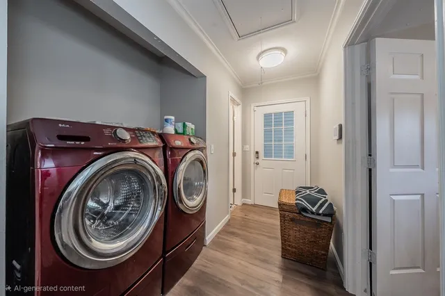 a view of bathroom with washer and dryer