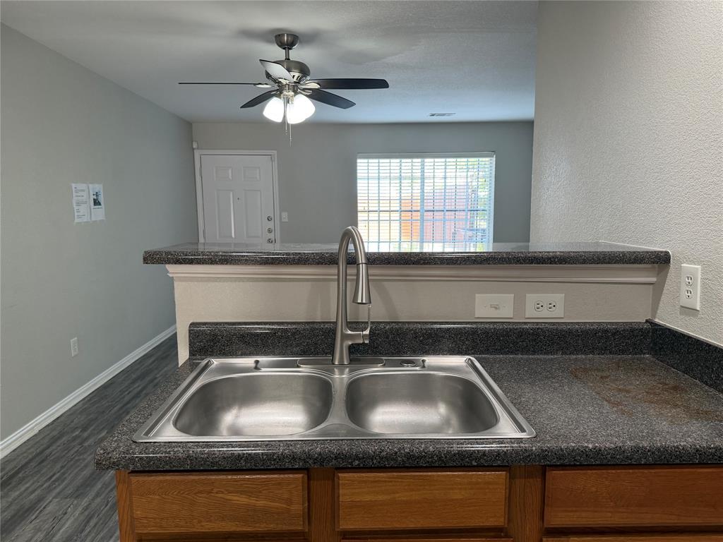 4005 Preferred Place Dallas, TX 75237 - Photo 11 of 31 a kitchen with a sink and a window