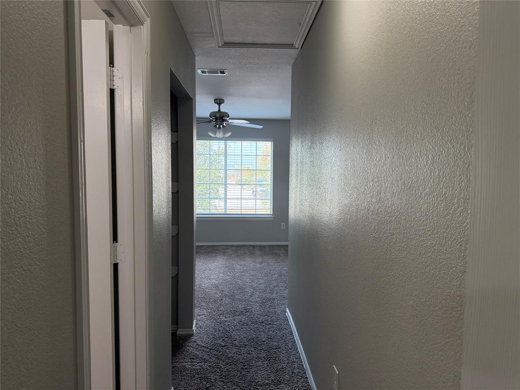 4005 Preferred Place Dallas, TX 75237 - Photo 19 of 31 a view of hallway with windows